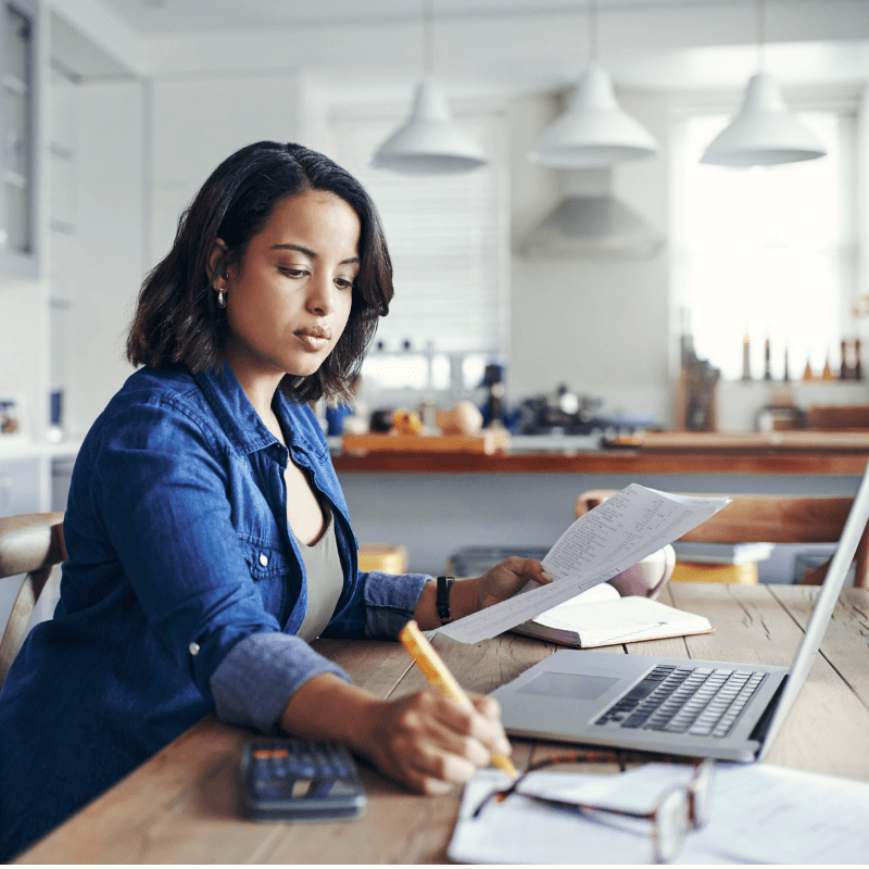 Young women working at her laptop